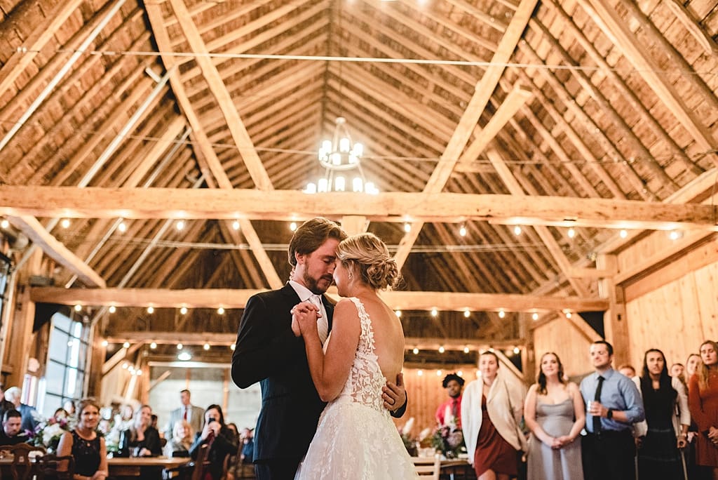 natural light first dance indoor barn wedding reception