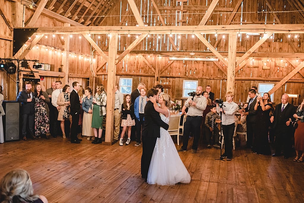 natural light first dance indoor barn wedding reception