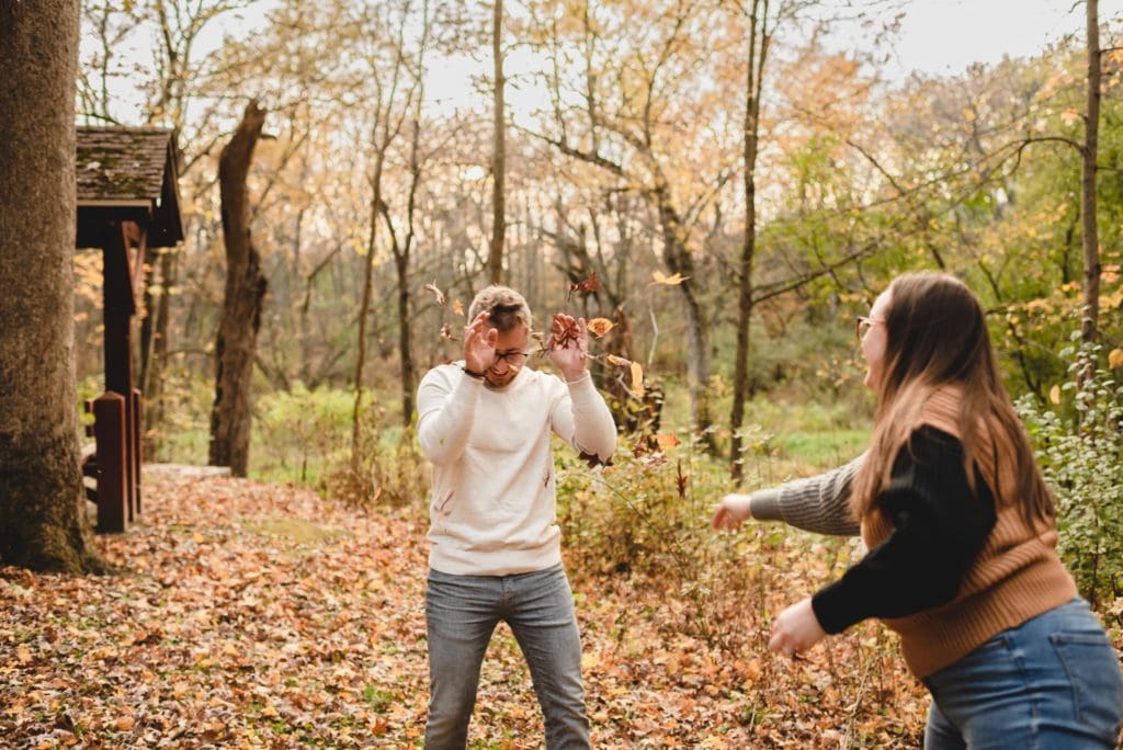 engagement session with a leaf fight