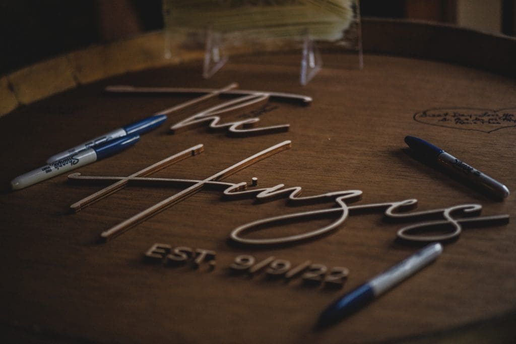 personalized circular wood guest book with last name