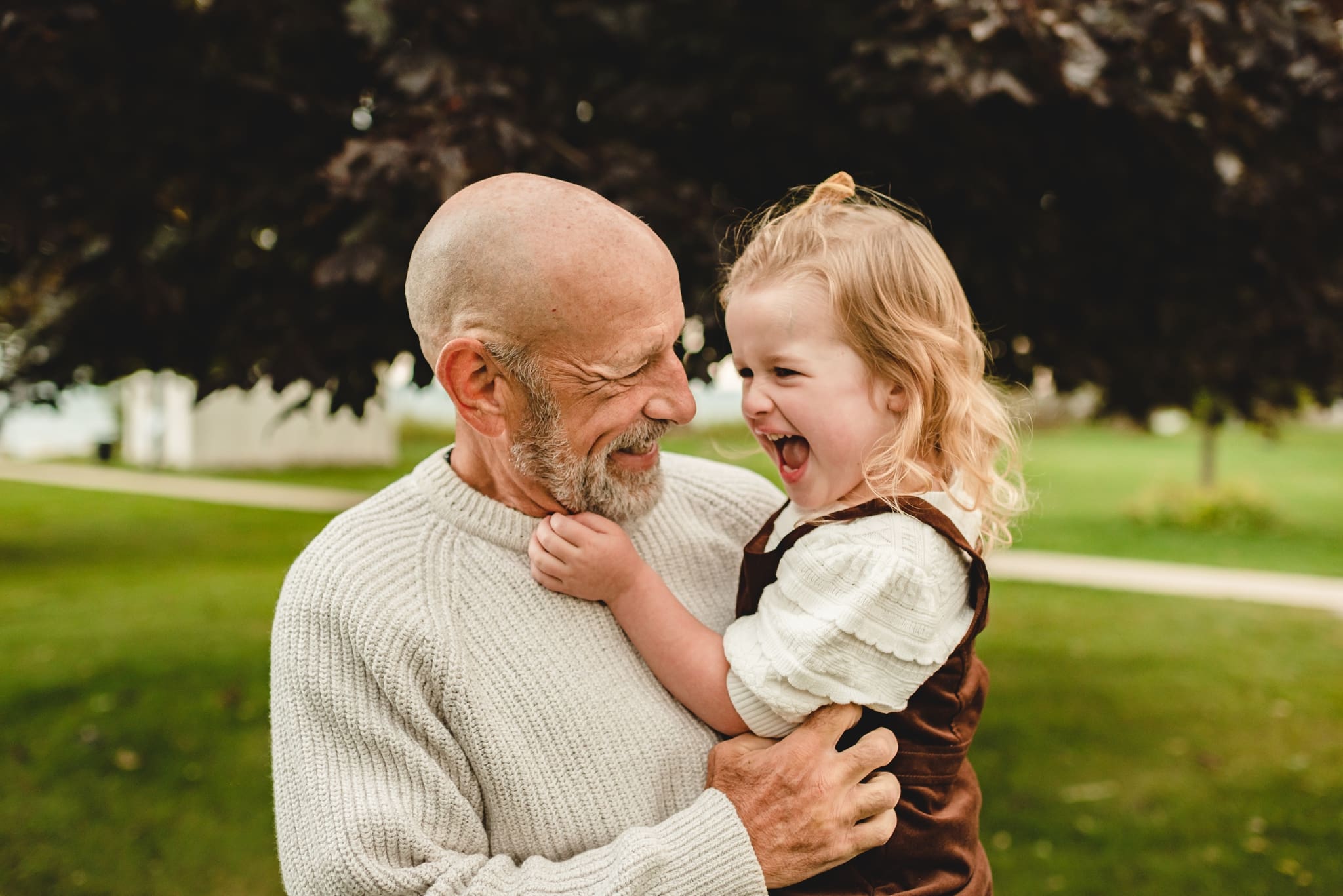 grandpa and granddaughter joyful photo
