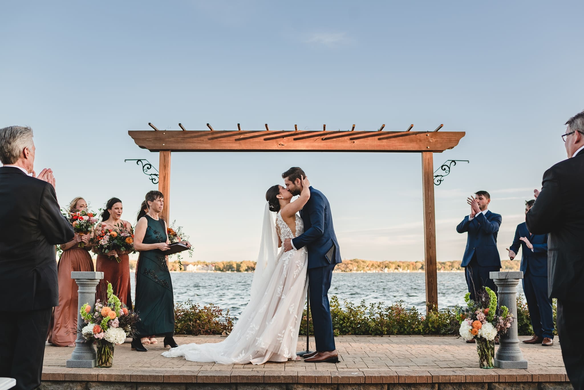 outdoor wedding ceremony on delavan lake at lake lawn resort