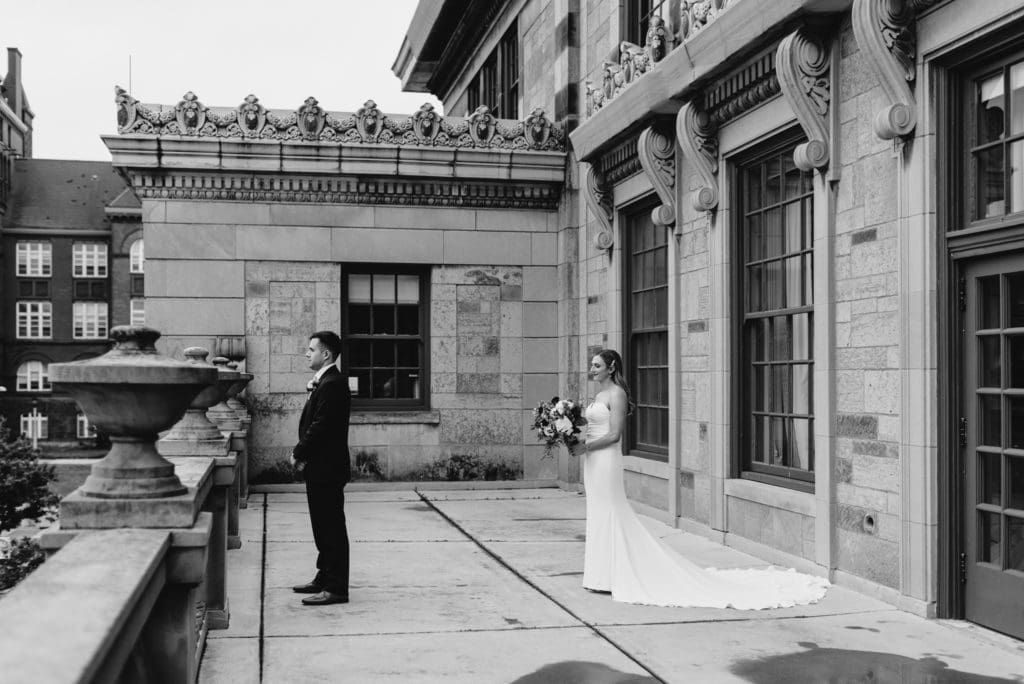 first look on the balcony at memorial union wedding