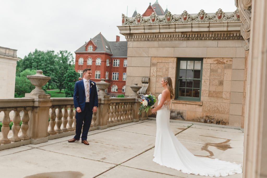 first look on the balcony at memorial union wedding
