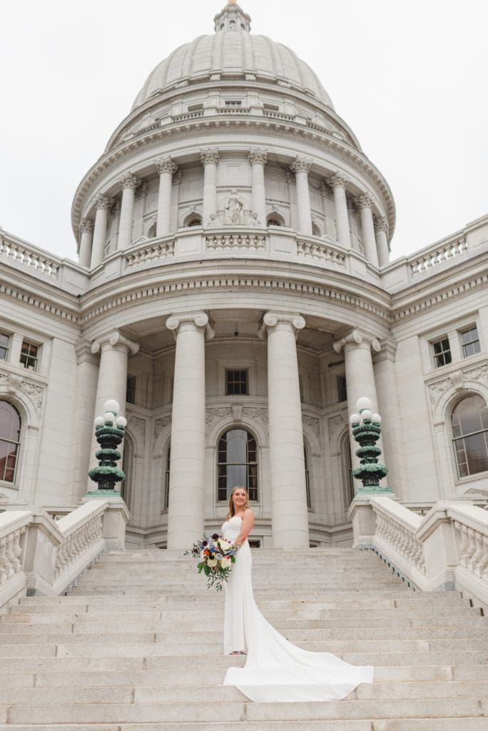 bridal photos on the steps of the wisconsin capitol building