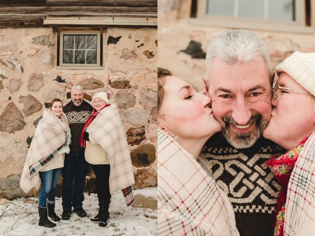 adult daughters kissing dad on the cheeks