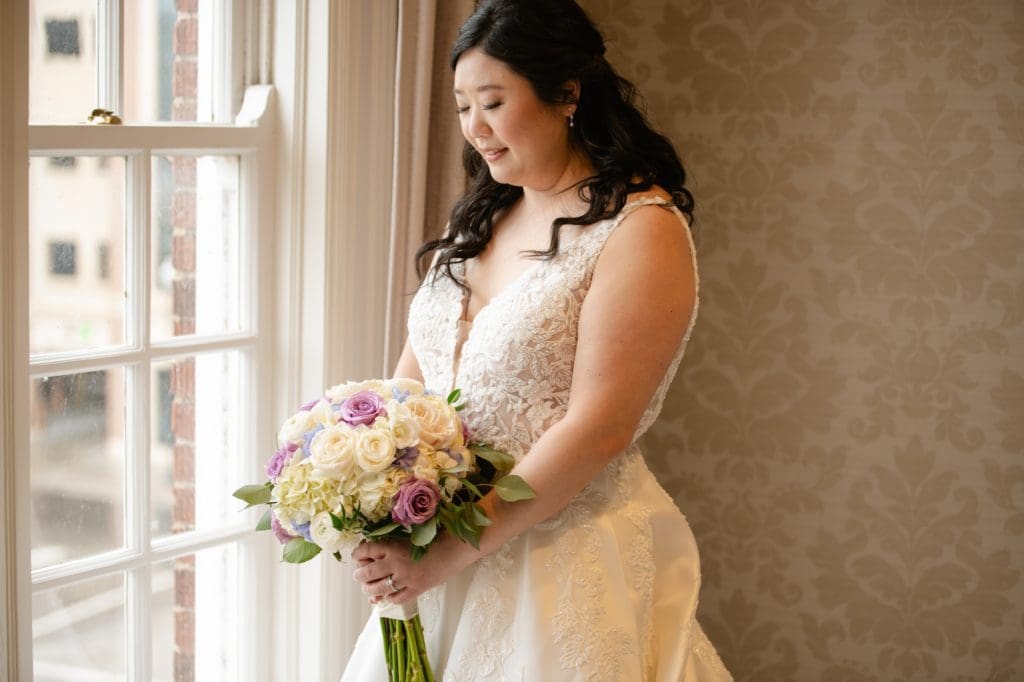 bridal portraits at the stella hotel in kenosha on the staircase