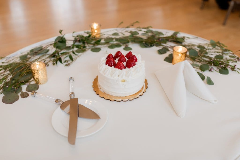 single serving wedding cake with strawberry toppings