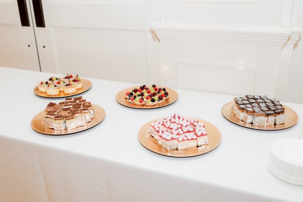 dessert bar with mini desserts for wedding reception