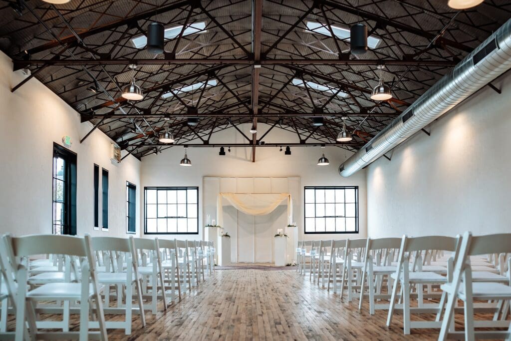 indoor wedding ceremony space at the tinsmith in madison
