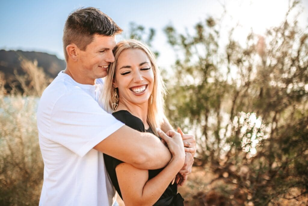 engagement photos in front of creosote bush