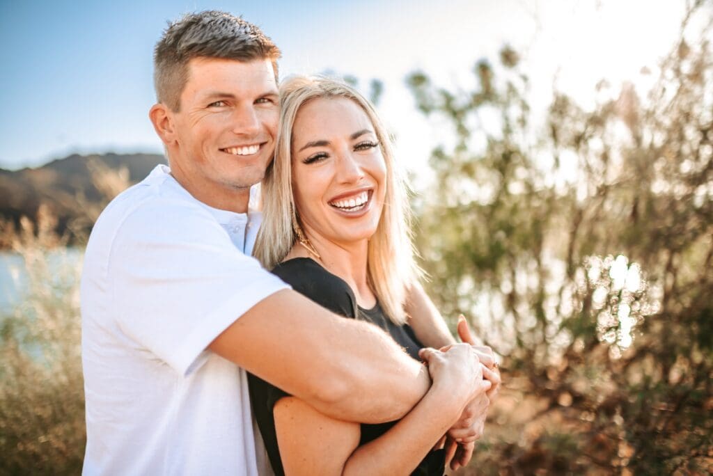 engagement photos in front of creosote bush