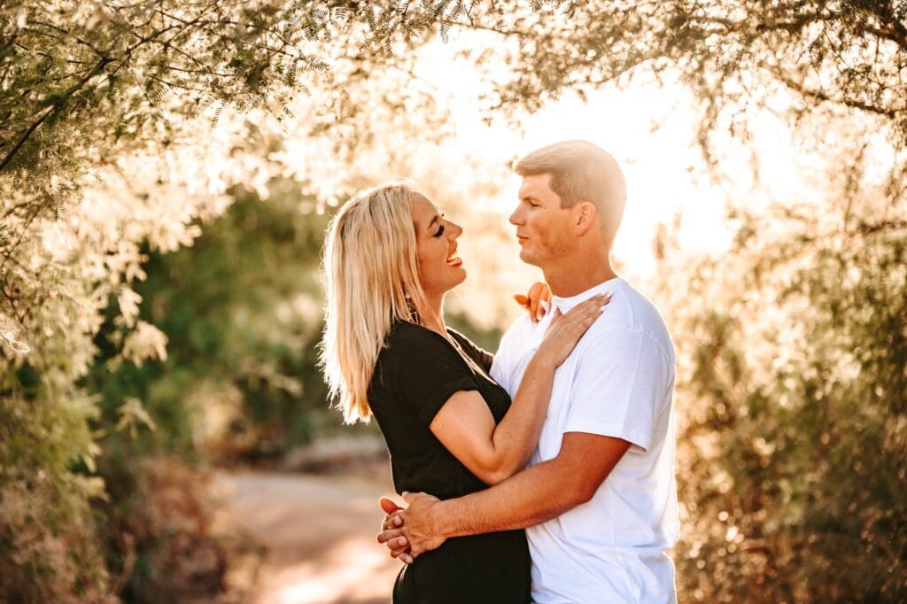 engaged couple looking at each other