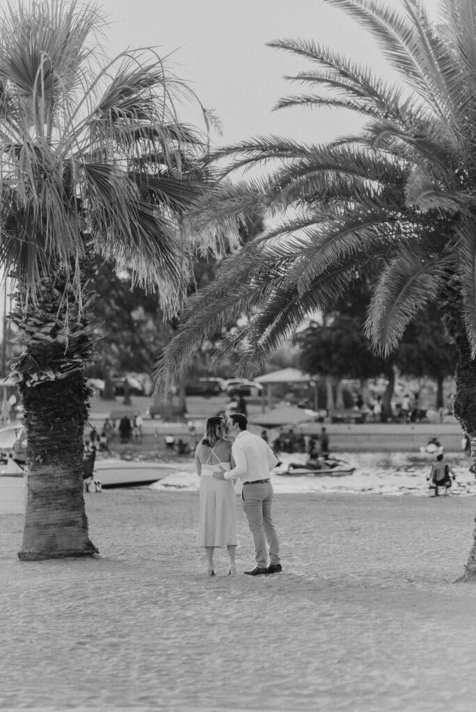 couple walking together at rotary park engagement session in lake havasu city