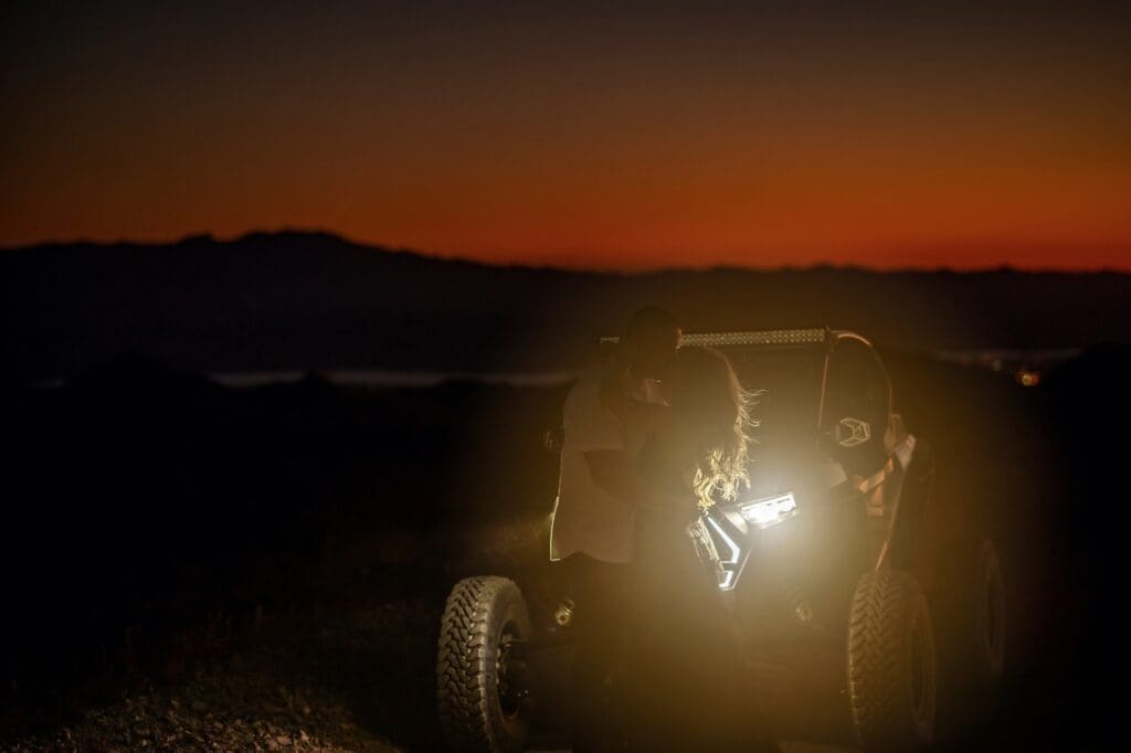 nighttime engagement photos offroading in the desert with polaris razr lake havasu city