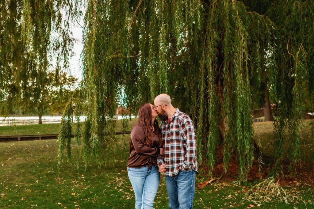 couples photos wearing brown and plaid