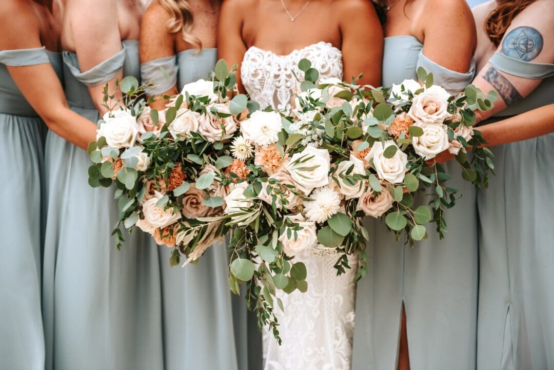 bridal party bouquets with sage bridesmaids dresses