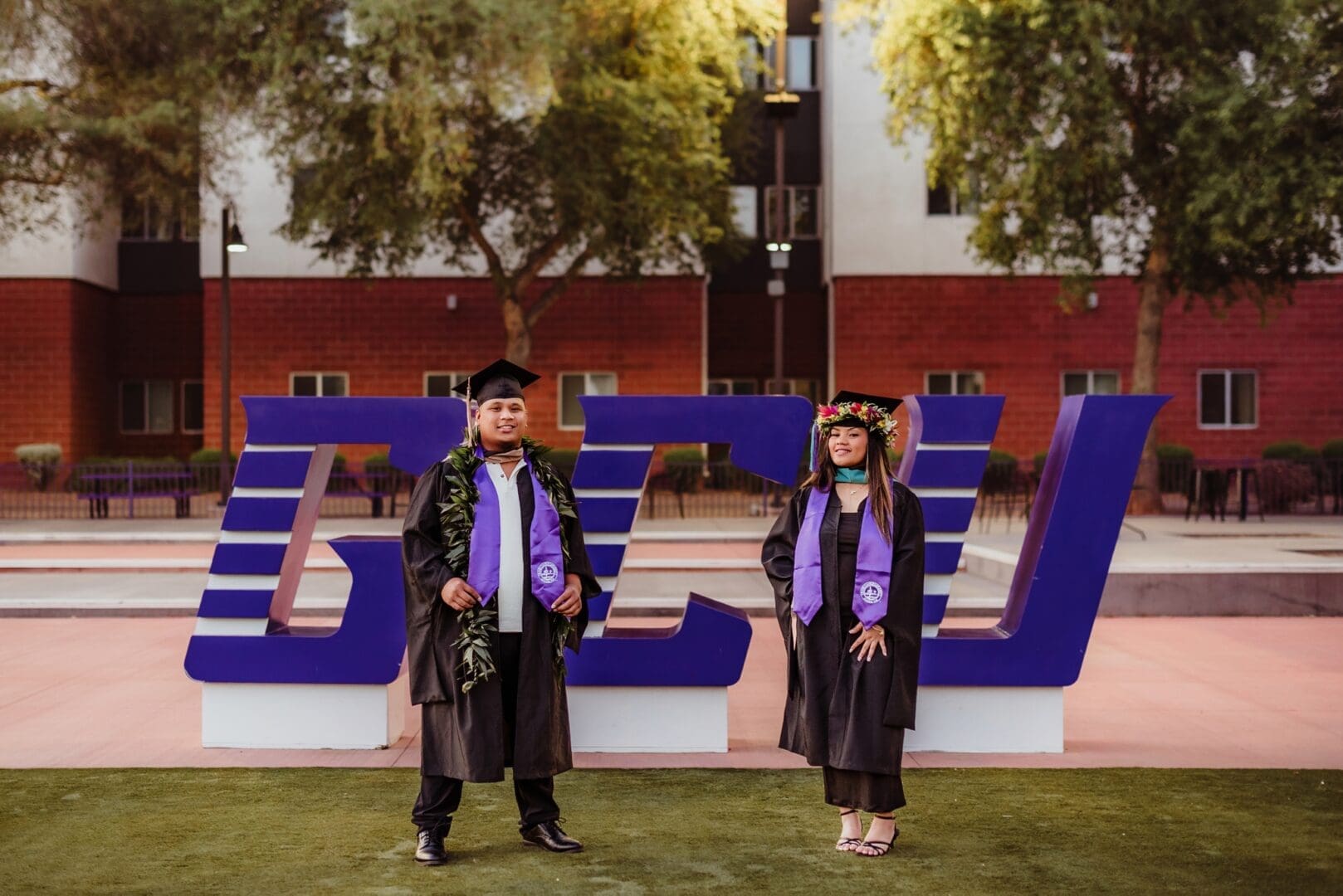 college senior photos in front of GCU letters at Grand Canyon University in Phoenix